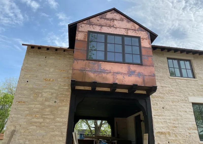 Copper metal panel facade on a stone building for Metal Roof Coating in Burtonsville